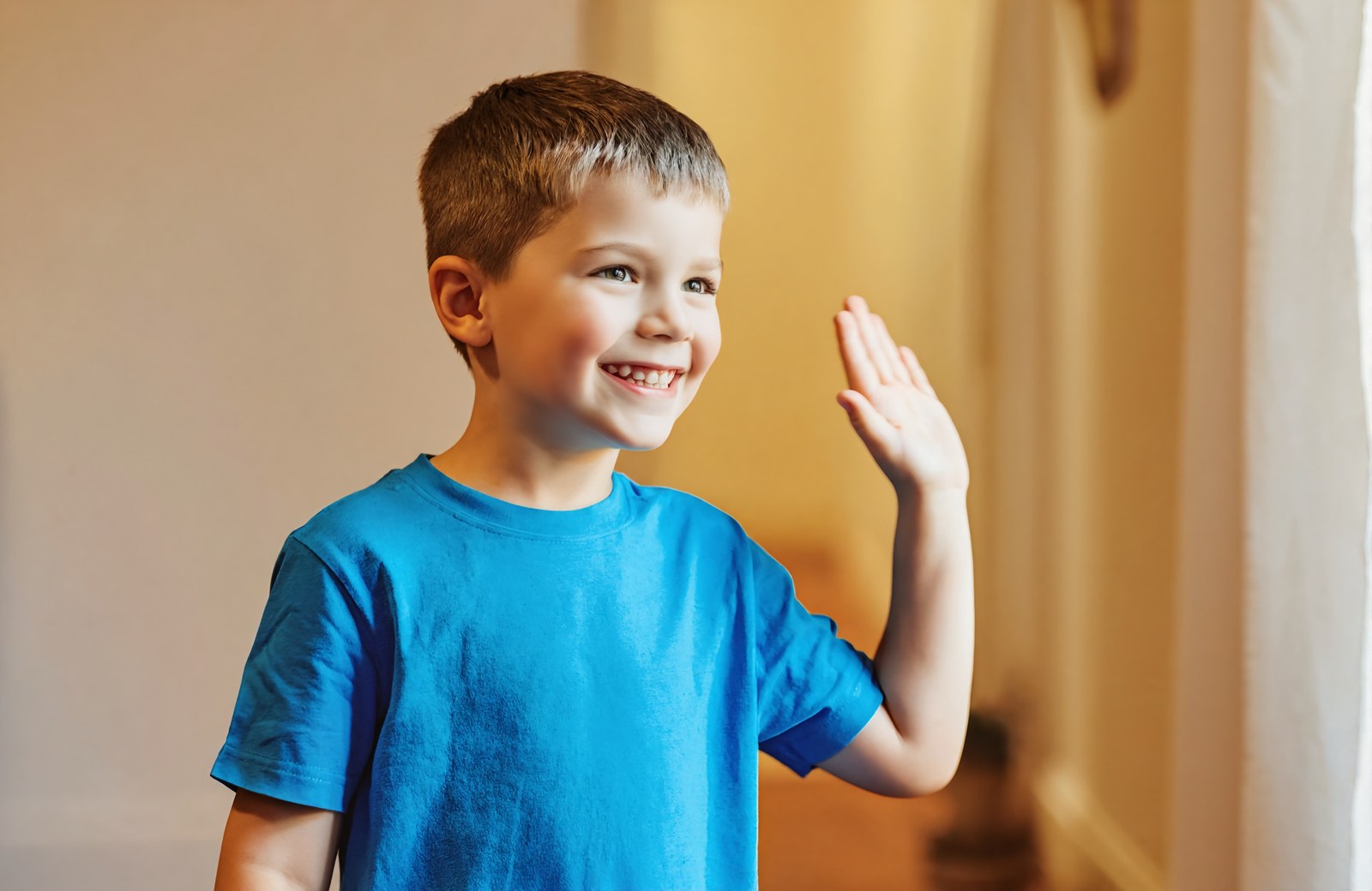 Child smiling during a school and sports physical at Total Health Urgent Care in Vancleave, MS